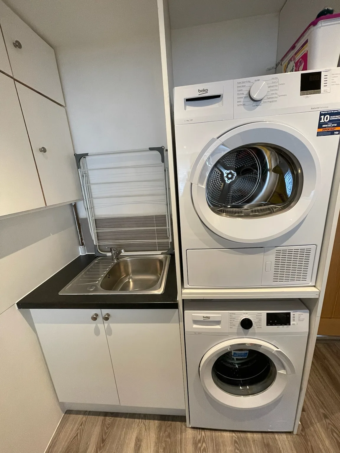 Utility area with laundry facilities